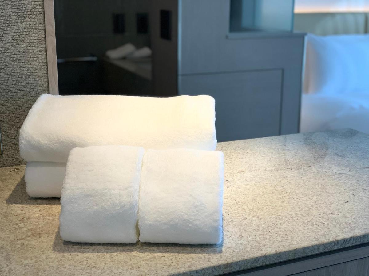 Hotel Zentis Osaka Exterior foto Bath towels