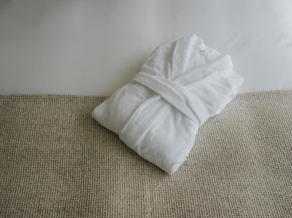 Hotel Zentis Osaka Exterior foto A folded bathrobe